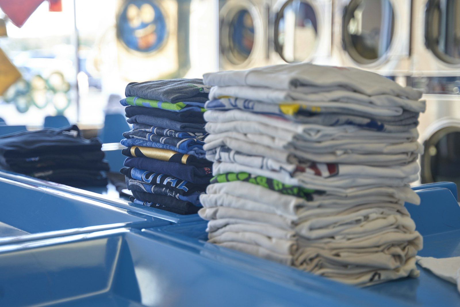 Freshly folded, neatly stacked laundry